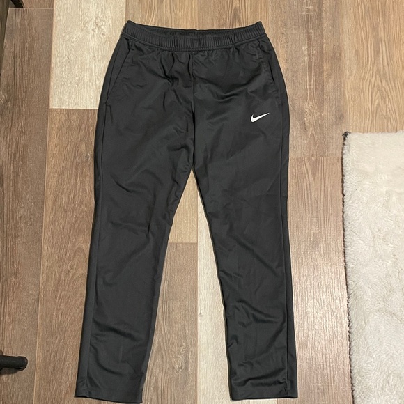 Nike dark gray Athletic Pants with White Swoosh - Picture 1 of 5